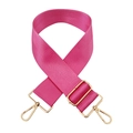 Macro view of adjustable magenta nylon bag strap with gold metal hooks and twill texture - Rose Pink