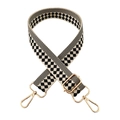 Detail of checkered jacquard strap with gold hardware hooks and adjustment buckle - Gold Buckle / Beige and Black Checkered