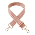 Close-up of pink and cream checkerboard jacquard wide bag strap with gold metal hooks - Beige and Pink Checkered