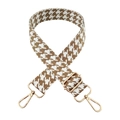 Detail of adjustable houndstooth shoulder strap with premium gold metal hardware - Khaki