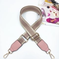Detail of adjustable bag strap with beige chevron weave and gold metal swivel hooks - Flesh Pink