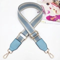 Detail of adjustable blue chevron woven strap with golden lobster clasps and leather ends - Light Blue