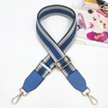 Detail of adjustable blue and beige herringbone bag strap with gold metal hardware - Lake Blue