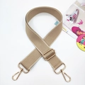 Detail of adjustable khaki canvas bag strap with polished gold-tone metal swivel hooks - Light Khaki