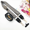 Detail showing jacquard wide strap with golden buckles, mini pouch and phone connector - Cross Flower Strap + Transparent Pouch + Gasket