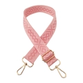 Close-up of pink geometric weave guitar style bag strap with light gold metal swivel hooks - Gold Buckle / Water Pink