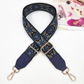 Detail of colorful jacquard wide strap with ethnic floral pattern and gold metal hooks - Gunmetal Buckle / Dark Blue + Blue