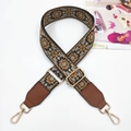 Detail of bohemian embroidered bag strap with floral patterns and gold metal swivel hooks - Gunmetal Buckle / Coffee Brown Webbing And Brown