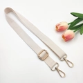 Detail of ivory cotton adjustable shoulder strap with premium gold metal buckles - Gold Buckle / Off White