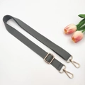 Detail of dark grey adjustable canvas strap with gold metal hooks and pink tulips - Gray