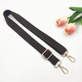 Detailed view of adjustable dark brown cotton shoulder strap with gold metal hardware - Brown