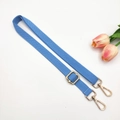 Close-up of sky blue adjustable cotton bag strap with polished gold metal hardware - 11-Lake Blue