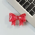 Vista ravvicinata dell'impugnatura per telefono a fiocco rosso con glitter e base chiara - Impugnatura con Fiocco Grande-Glitter a Pois-Rosso