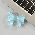Detail of light blue glitter bow phone grip tok on laptop keyboard with sparkling finish - Large Bow Grip-Dot Glitter-Blue