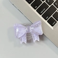 Macro shot of glittery purple bow phone grip on a silver metallic laptop surface - Large Bow Grip-Dot Glitter-Light Purple