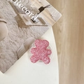 Detail of pink rhinestone bear phone grip showing sparkling crystals and collapsible stand - Starry Epoxy Full Rhinestone Bear / Pink