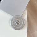 Macro shot of silver magnetic phone grip featuring a sparkling rhinestone star design - Rhinestone Pearl Mini Star / Silver