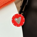 Close-up of red magnetic phone socket with mirror heart and mine text engraving - Transparent Paste Stand - Dopamine Small Heart Mirror / Red