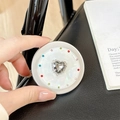 Detail of magnetic phone socket with heart gem and colorful rhinestones on shell texture - Matte Silver Magnetic - Sweetheart / Gray