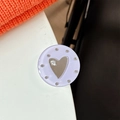 Macro shot of a light purple translucent heart mirror phone grip with mine text and rhinestones - Transparent Paste Stand - Dopamine Small Heart Mirror / Purple