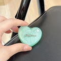 Detail of heart-shaped mint green magnetic phone stand with silver glitter and logo - Stereo Heart - Green Glitter / Adhesive Stand Style