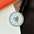 Macro detail of silver heart-shaped mirror phone grip with mi ne text and crystals - Matte Silver Magnetic - Dopamine Small Heart Mirror / Mint Green