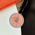 Detail of pink resin heart phone grip with silver mirror finish and mi ne text - Matte Silver Magnetic - Dopamine Small Heart Mirror / Orange