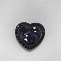 Close-up of heart-shaped phone ring holder with purple rhinestones and dark nickel base - Heart Ring / Purple