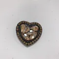 Macro detail of heart-shaped metal phone ring holder with rhinestones and champagne gems - Heart Ring / Gold