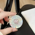 Detail of magnetic phone grip with pink heart gemstone and colorful rhinestones - Transparent Stand - Sweetheart / Pink