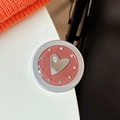 Detail of round phone stand with rose pink base, mirrored heart, and small rhinestones - Matte Silver Magnetic - Dopamine Small Heart Mirror / Brown