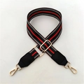 Detail of adjustable green and red striped wide shoulder strap with gold metal hooks - Green Striped Brown Edge + Black Leather