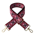 Detailed view of adjustable geometric jacquard bag strap with golden metal swivel hooks - Silver Clasp / Black Red Flower