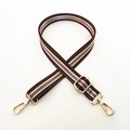 Detail view of ethnic stripe canvas strap with adjustable golden lobster clasps and buckles - Brown Stripe