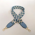 Detail of adjustable blue and white checkered strap with gold swivel hooks and leather ends - Lake Blue