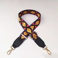 Close-up of ethnic patterned wide shoulder strap with geometric weave and gold hooks - No.1 + Black Leather Trim