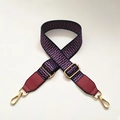 Detail of adjustable wide woven bag strap with colorful geometric pattern and gold hooks - No.5 + Wine Red Leather Trim