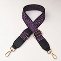 Close-up of geometric woven replacement bag strap with gold metal hardware and leather ends - No.5 + Black Leather Trim