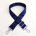 Detail of adjustable wide shoulder strap with blue wave patterns and silver metal buckles - Blue Black With Silver Buckle