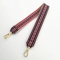 Close-up of 3.8cm wide ethnic geometric embroidered strap with gold metal swivel clasps - Style 1 Short