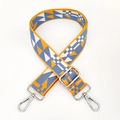 Detail of colorful geometric woven strap with thick cotton webbing and silver metal clasps - Yellow Blue Silver Buckle