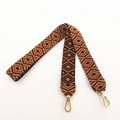 Detail of colorful geometric woven shoulder strap with gold metal hooks and leather joints - Long Style / Dark Brown