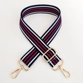 Detail of adjustable woven handbag strap with red white blue stripes and gold metal hooks - Navy Red Stripe Gold Buckle