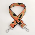 Detail of adjustable leopard print bag strap with orange weaving and silver metal hooks - Orange Gold Line + Silver Buckle