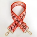 Detail of adjustable geometric V-pattern woven strap with gold metal hooks for handbags - Orange 2