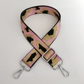 Close-up of pink and gold leopard jacquard bag strap with silver metal swivel hooks - Pink Gold Thread + Silver Buckle