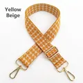 Close-up of yellow and beige houndstooth bag strap with adjustable gold metal buckle - Beige Yellow
