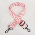 Detail of pink and white zebra pattern strap with matte black metal hardware - Pink Gunmetal Buckle