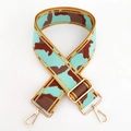 Detail of blue and brown geometric webbing strap with gold swivel hooks and metal buckle - Gunmetal Buckle / Gold Wire No.7