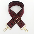 Close-up of thick ethnic paisley jacquard bag strap with gold metal lobster clasps - No.7 Black Red
